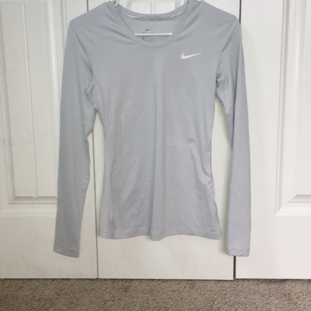 Size small women’s Nike DRI-FIT shirt.